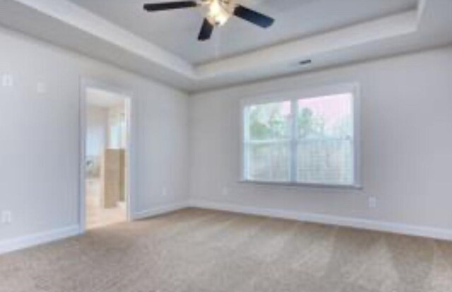 1091 Boulder Dr, Gray, GA 31032 - kitchen with baseboards, a healthy amount of sunlight, ceiling fan, and dishwasher