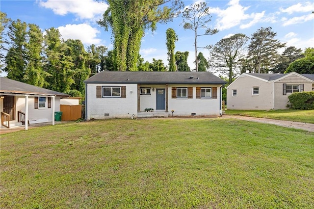 2677 Tilson Rd, Decatur, GA 30032 - view of front of house featuring crawl space, entry steps, a front lawn, and brick siding