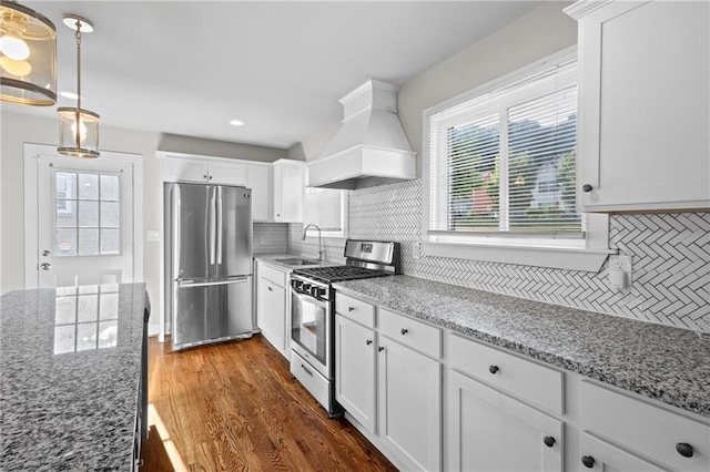 2677 Tilson Rd, Decatur, GA 30032 - kitchen featuring stainless steel appliances, custom range hood, a sink, backsplash, and recessed lighting