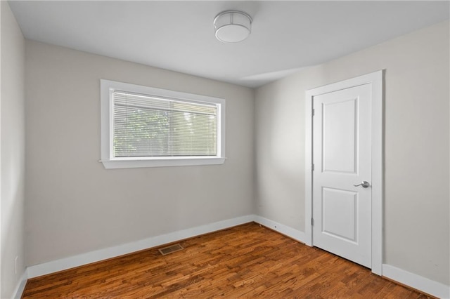 2677 Tilson Rd, Decatur, GA 30032 - empty room with baseboards and wood finished floors