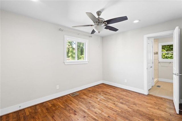 2677 Tilson Rd, Decatur, GA 30032 - spare room with baseboards, light wood-style flooring, a ceiling fan, and recessed lighting