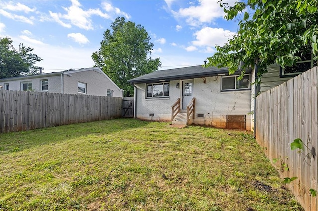 2677 Tilson Rd, Decatur, GA 30032 - back of house featuring entry steps, crawl space, and brick siding