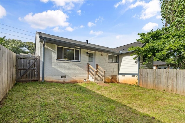 2677 Tilson Rd, Decatur, GA 30032 - rear view of house with crawl space, entry steps, and brick siding