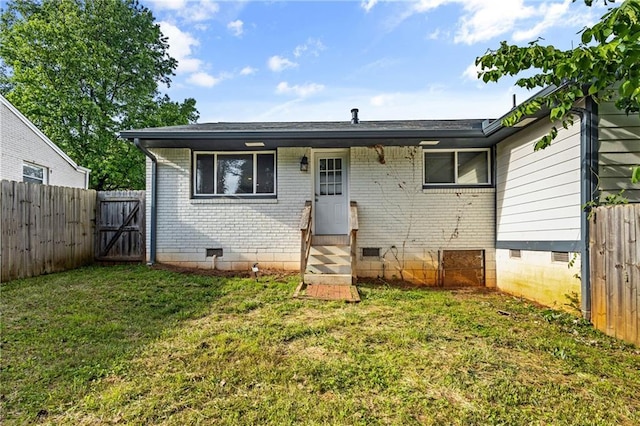 2677 Tilson Rd, Decatur, GA 30032 - view of front of property featuring crawl space, entry steps, brick siding, and a gate