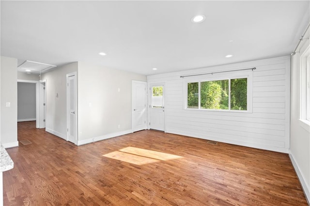 2677 Tilson Rd, Decatur, GA 30032 - empty room with attic access, wood finished floors, recessed lighting, and baseboards