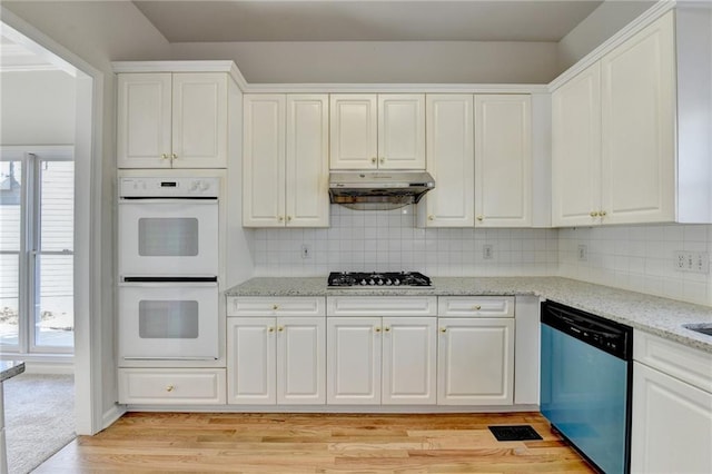 kitchen with double oven, white cabinetry, dishwasher, and gas stovetop