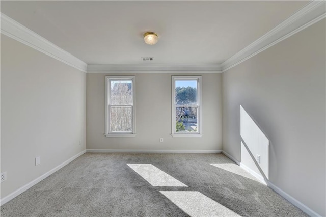 unfurnished room featuring ornamental molding and light carpet