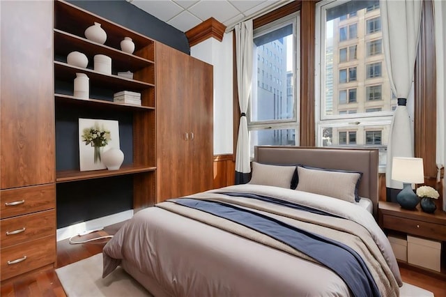 bedroom featuring wood finished floors