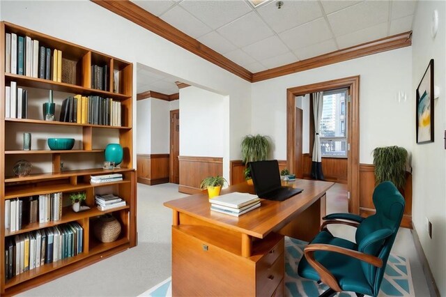 carpeted home office featuring ornamental molding