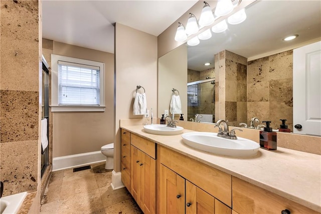 full bathroom with shower with separate bathtub, vanity, and toilet