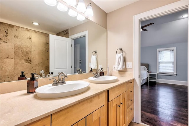 bathroom featuring vanity and ceiling fan