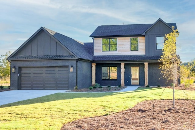 view of front of property featuring brick siding, concrete driveway, an attached garage, board and batten siding, and a front lawn