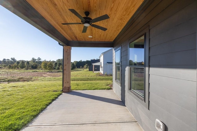 view of patio featuring ceiling fan