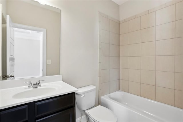 full bathroom featuring toilet, vanity, and washtub / shower combination