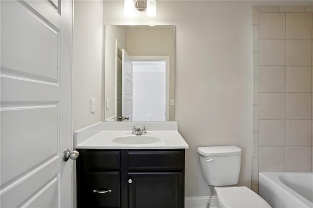 full bath with toilet and vanity