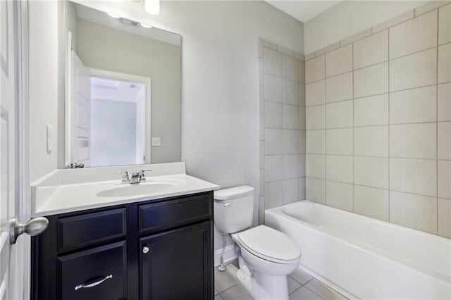 bathroom with tile patterned floors, toilet, and vanity