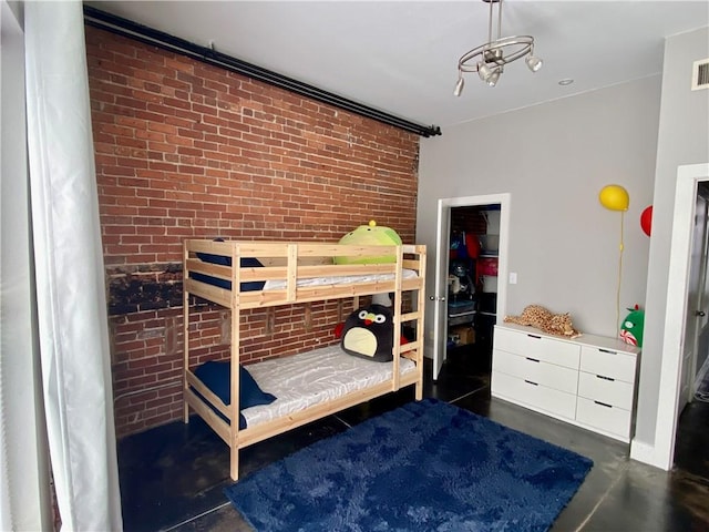 bedroom with brick wall