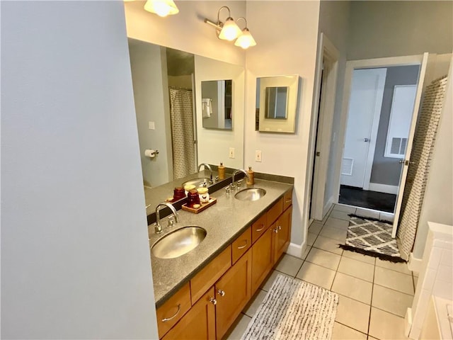 bathroom featuring vanity and tile patterned floors