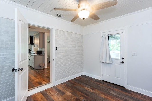 3336 Forrest Hills Dr, Hapeville, GA 30354 - spare room with dark wood-style flooring, brick wall, ceiling fan, and crown molding