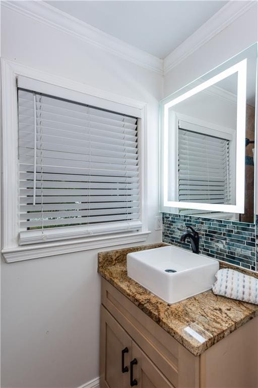 3336 Forrest Hills Dr, Hapeville, GA 30354 - bathroom with vanity, backsplash, and crown molding