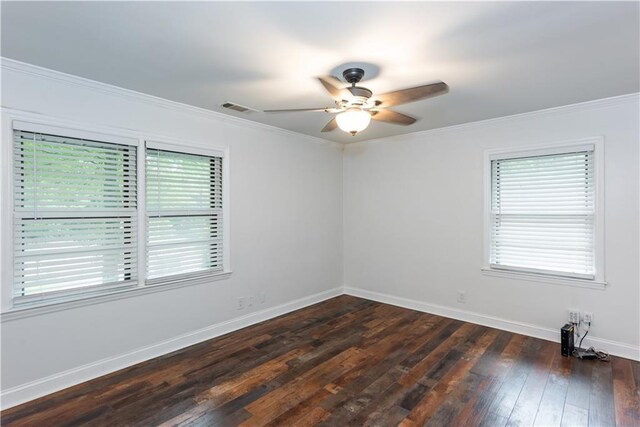3336 Forrest Hills Dr, Hapeville, GA 30354 - unfurnished room with healthy amount of natural light, a ceiling fan, crown molding, and dark wood-style flooring