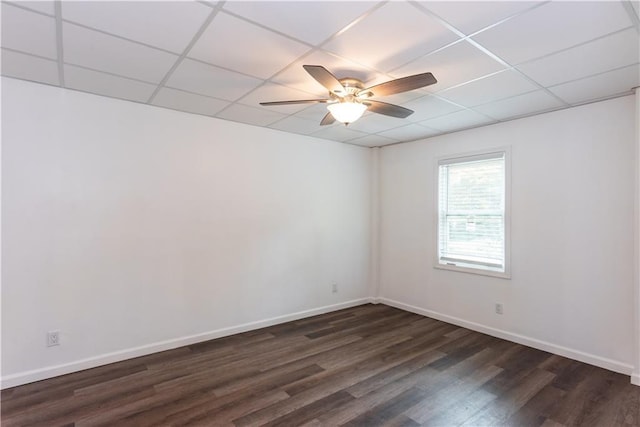 3336 Forrest Hills Dr, Hapeville, GA 30354 - empty room featuring a drop ceiling, dark wood-type flooring, and ceiling fan