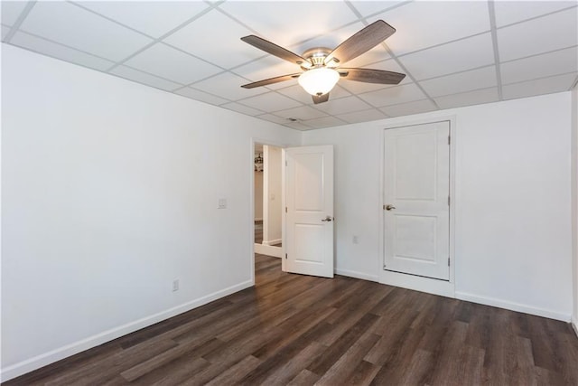 3336 Forrest Hills Dr, Hapeville, GA 30354 - unfurnished bedroom featuring a paneled ceiling, dark wood-style flooring, and ceiling fan
