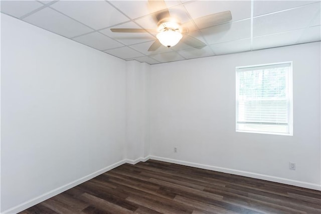 3336 Forrest Hills Dr, Hapeville, GA 30354 - unfurnished room with a drop ceiling, dark wood-style flooring, and a ceiling fan
