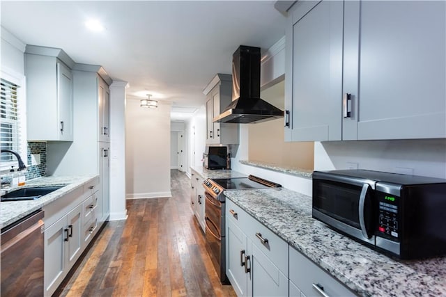 3336 Forrest Hills Dr, Hapeville, GA 30354 - kitchen featuring wall chimney exhaust hood, appliances with stainless steel finishes, dark wood-style flooring, decorative backsplash, and light stone countertops