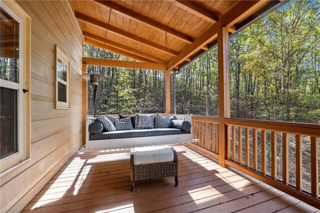 wooden deck with outdoor lounge area