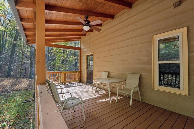 wooden terrace featuring ceiling fan