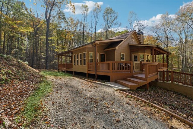 view of home's exterior with a deck