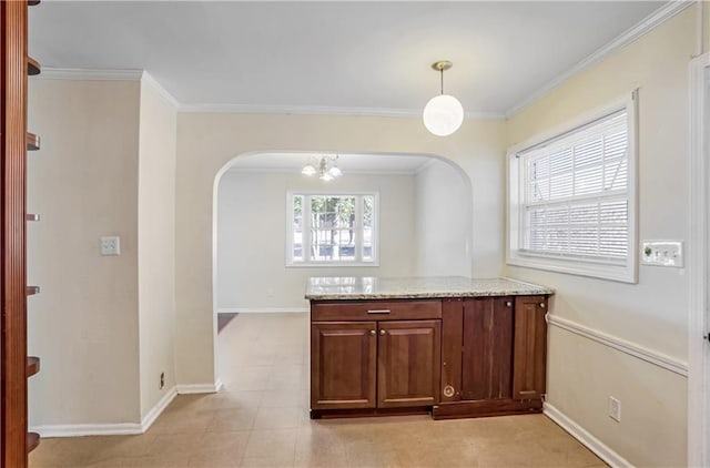 unfurnished dining area featuring crown molding and light tile patterned flooring