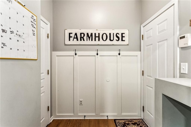 mudroom featuring dark wood-style flooring