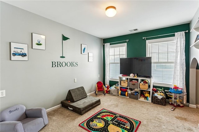 recreation room featuring visible vents, carpet, and baseboards