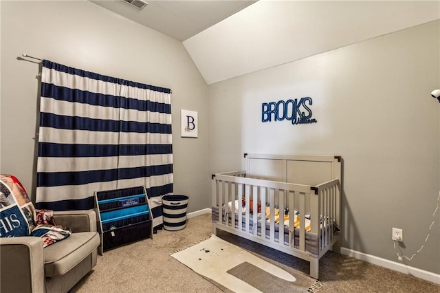 carpeted bedroom with baseboards, lofted ceiling, and visible vents