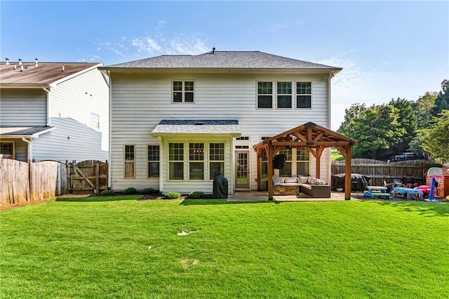 rear view of house with a gate, an outdoor hangout area, a fenced backyard, and a patio area
