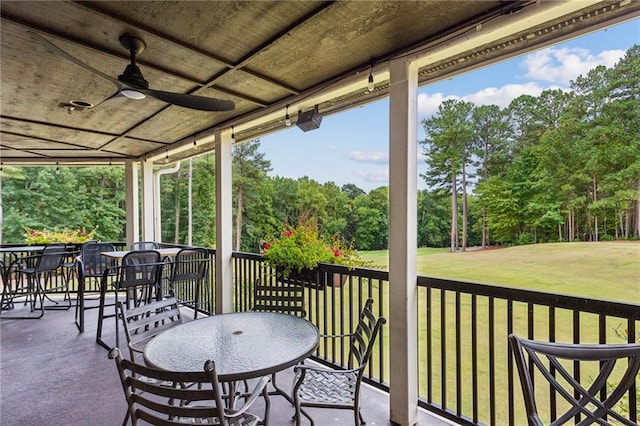 view of patio / terrace featuring outdoor dining area and ceiling fan