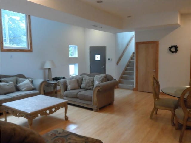 living room with light hardwood / wood-style floors