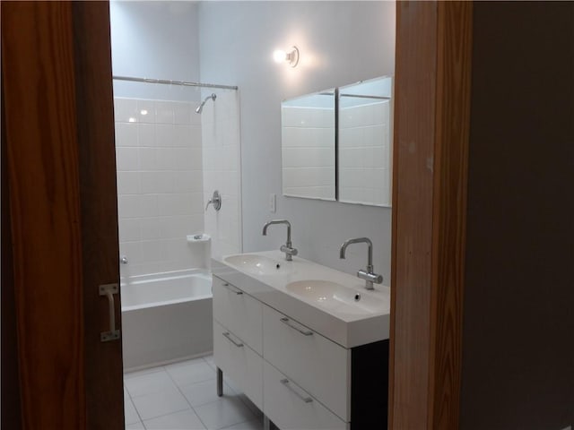 bathroom featuring vanity, bathing tub / shower combination, and tile patterned floors