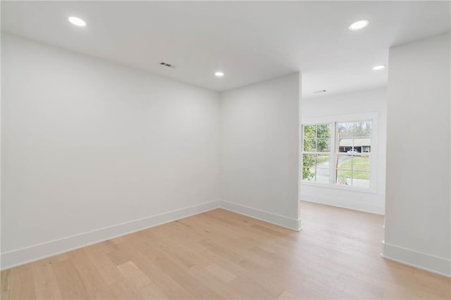 empty room with light wood-type flooring