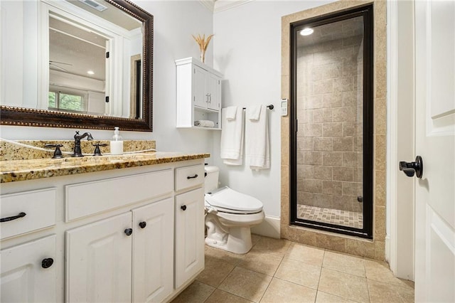 3809 Wieuca Rd NE, Atlanta, GA 30342 - bathroom featuring toilet, crown molding, a shower stall, vanity, and tile patterned floors