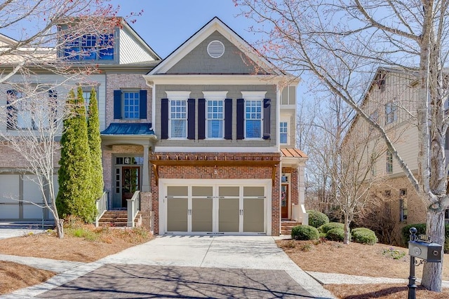 view of front facade featuring concrete driveway, brick siding, and a garage