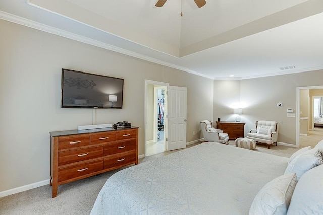 bedroom with light carpet, ceiling fan, crown molding, and baseboards