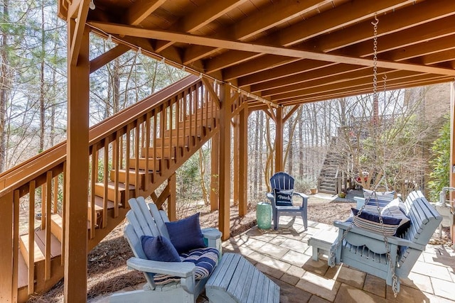 deck with stairs and a patio area