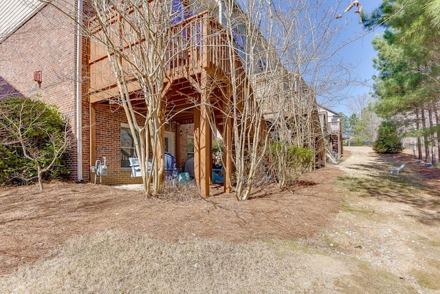 exterior space featuring brick siding