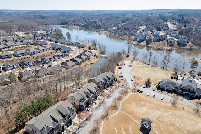 aerial view featuring a residential view and a water view