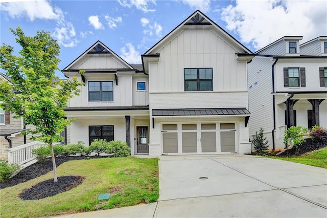 1620 Branthaven Ln, Auburn, GA 30011 - modern inspired farmhouse featuring board and batten siding, driveway, an attached garage, and brick siding
