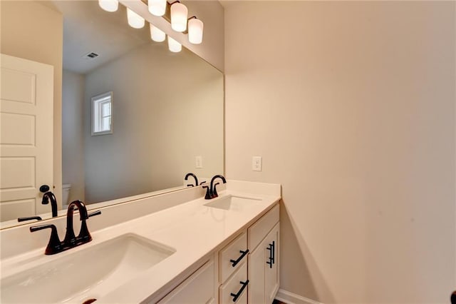 1620 Branthaven Ln, Auburn, GA 30011 - full bathroom with double vanity and toilet
