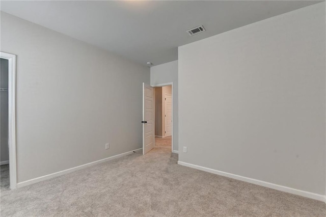 1620 Branthaven Ln, Auburn, GA 30011 - unfurnished bedroom featuring carpet, a walk in closet, and a closet